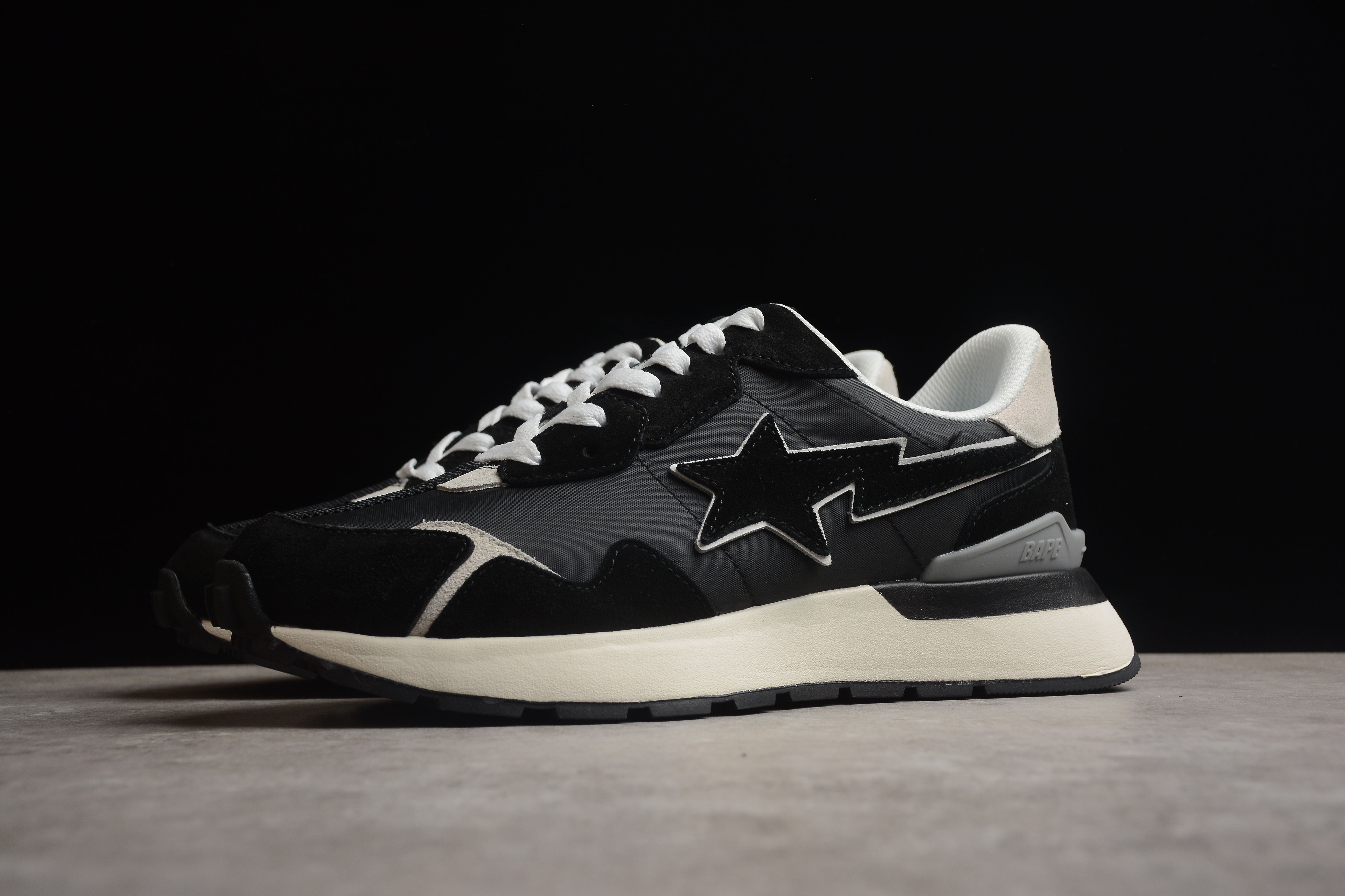 BAPE STA Retro Runner Black and White Sneakers - Image 8
